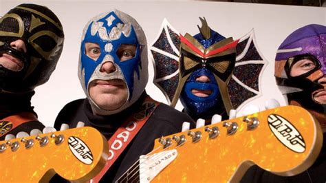 Los straightjackets - Los Straitjackets. Los Straitjackets are the leading practitioners of the lost art of the guitar instrumental. Using the music of the Ventures, The Shadows, and with Link Wray and Dick Dale as a jumping-off point, the band has taken their unique, high-energy brand of original rock & roll around the world. Clad in their trademark Lucha Libre ... 